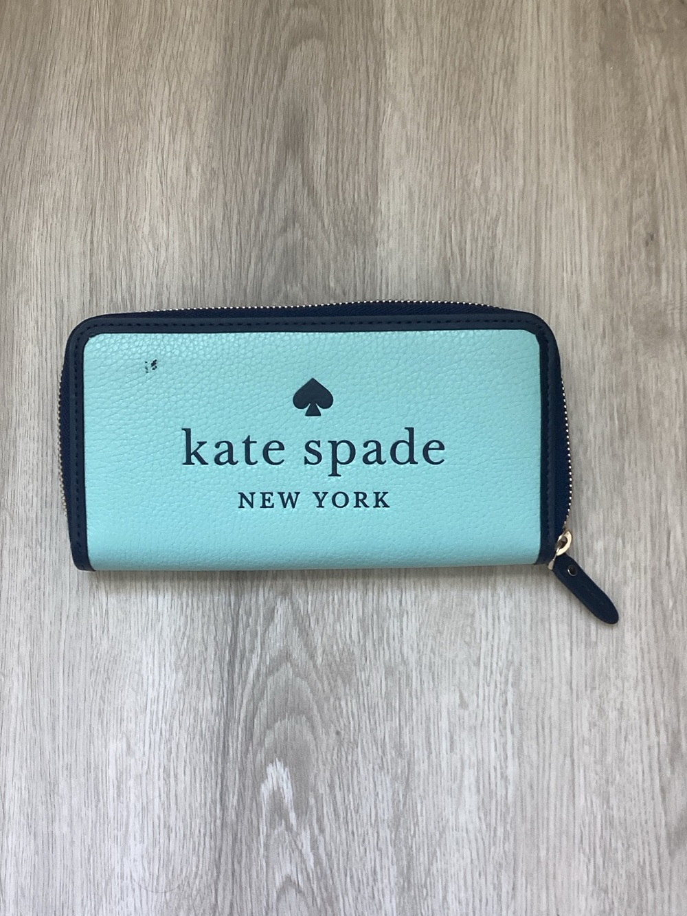kate spade mint and black zip-around wallet